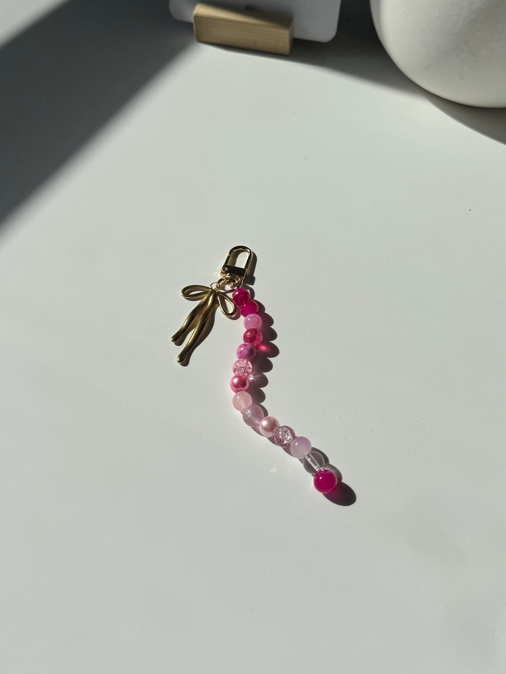 Beaded Keychain – Shades of Pink Glass Beads with Gold Bow Accent