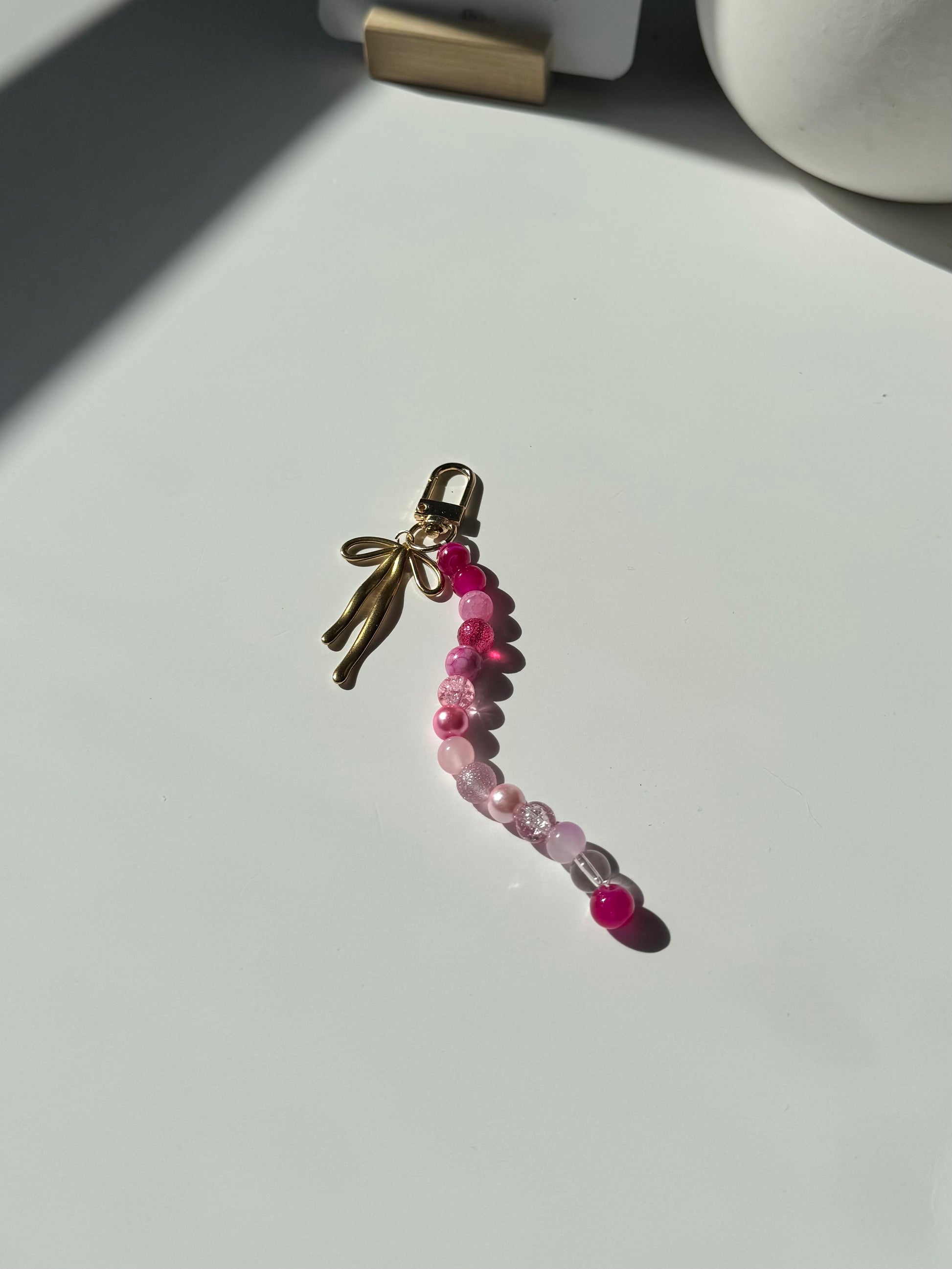 Beaded Keychain – Shades of Pink Glass Beads with Gold Bow Accent