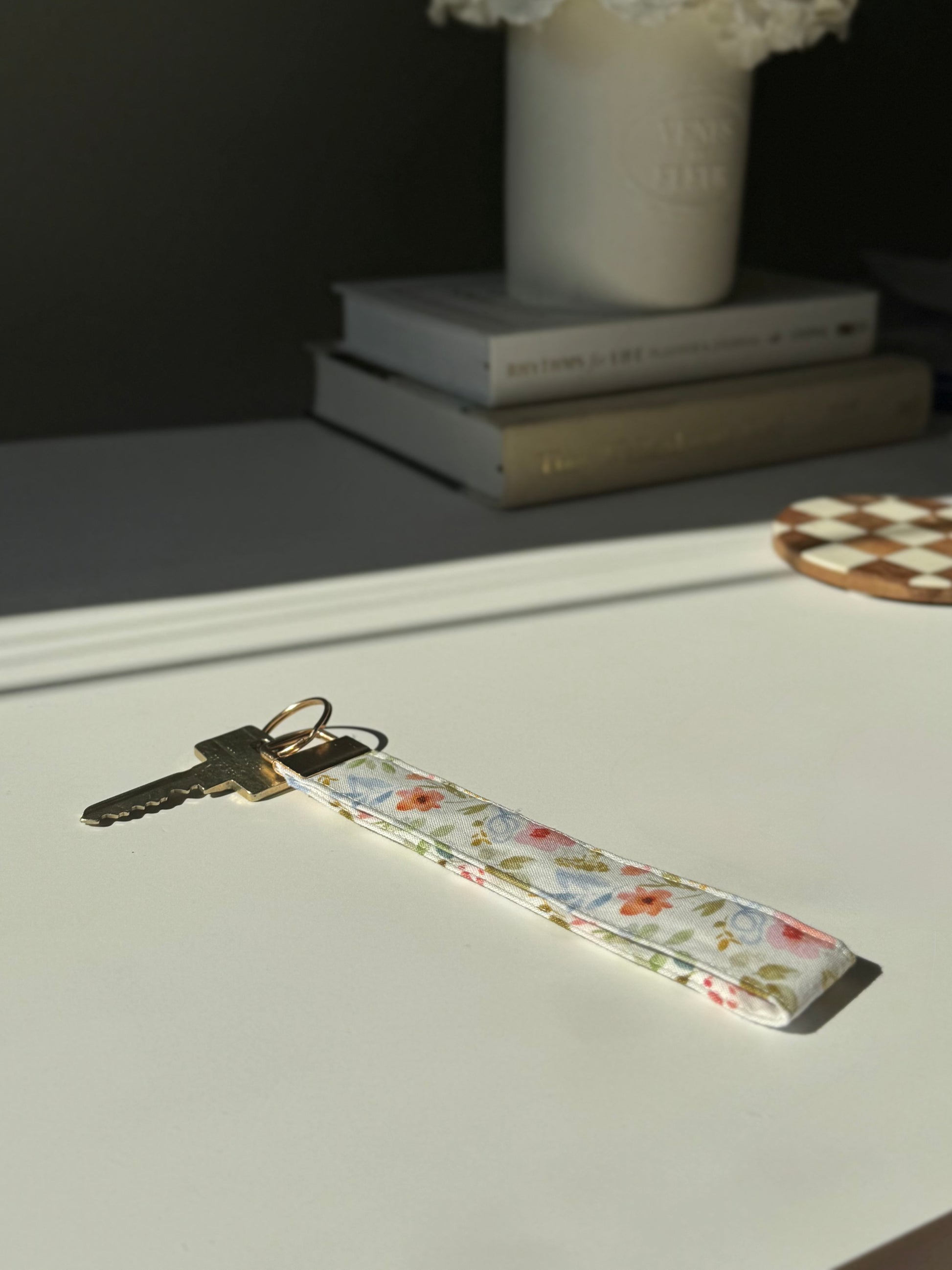Floral Fabric Wristlet Keychain – Orange & Coral Flowers with Blue Bows