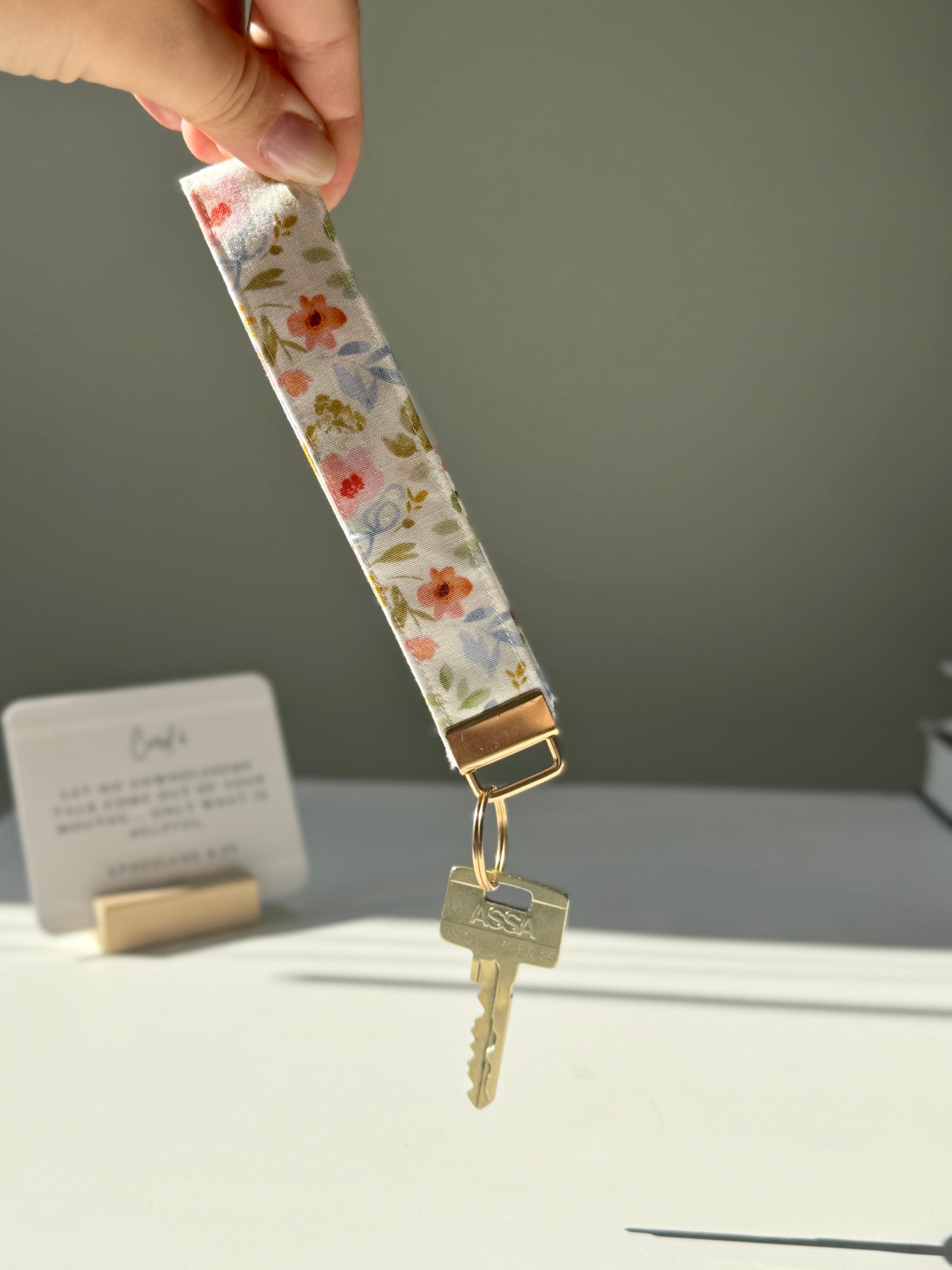 Floral Fabric Wristlet Keychain – Orange & Coral Flowers with Blue Bows